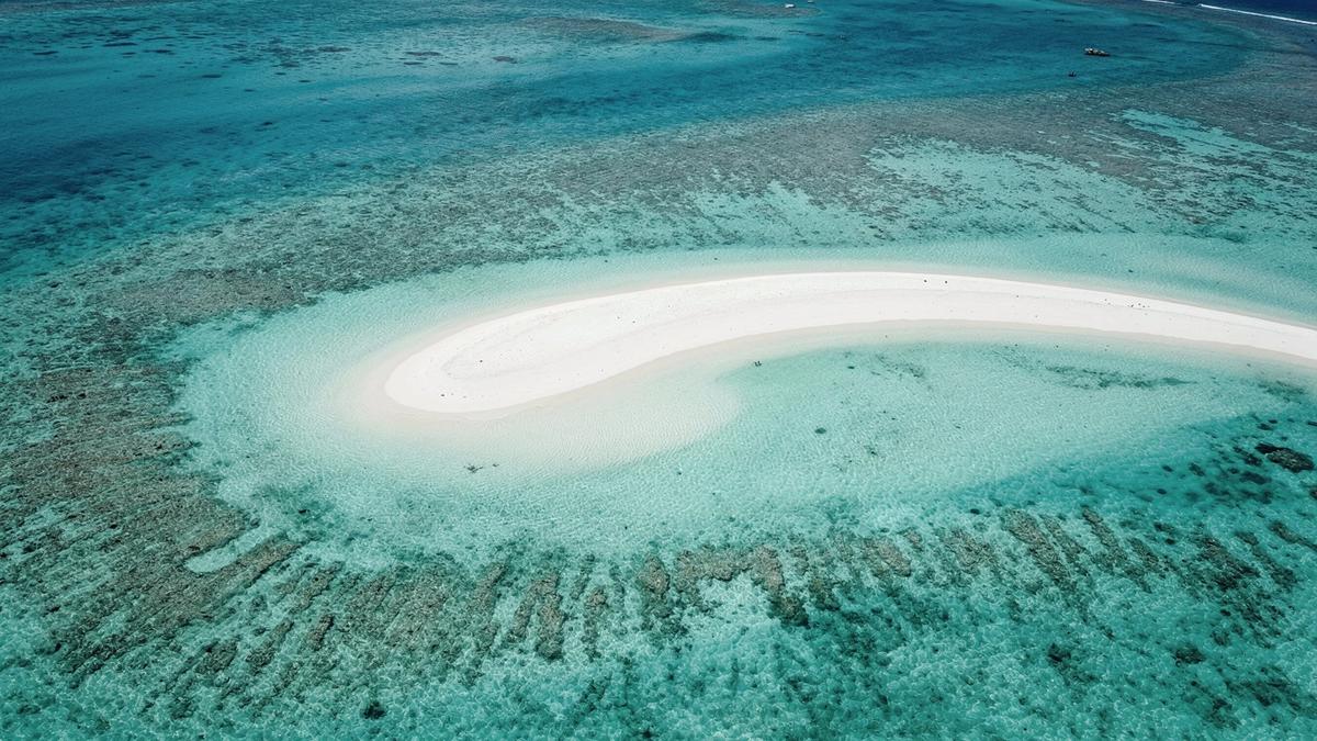 Turquoise lagoon and sandbank in North Male Atoll, Maldives